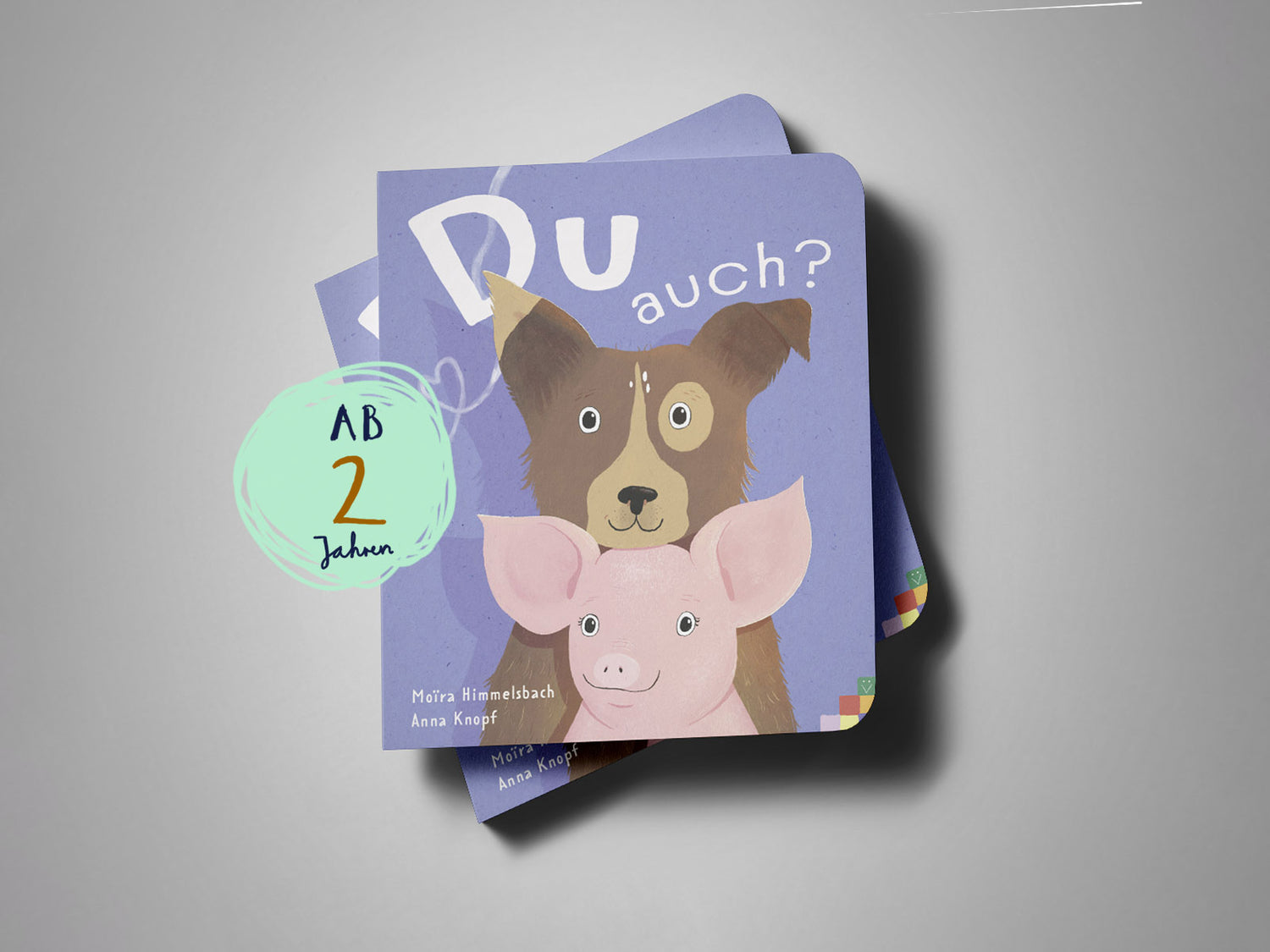 Buchcover „Du auch?“: Illustration eines Hundes und eines Schweins, die den Betrachter freundlich anschauen. Stabiles Pappbuch für Kinder ab 2 Jahren.
